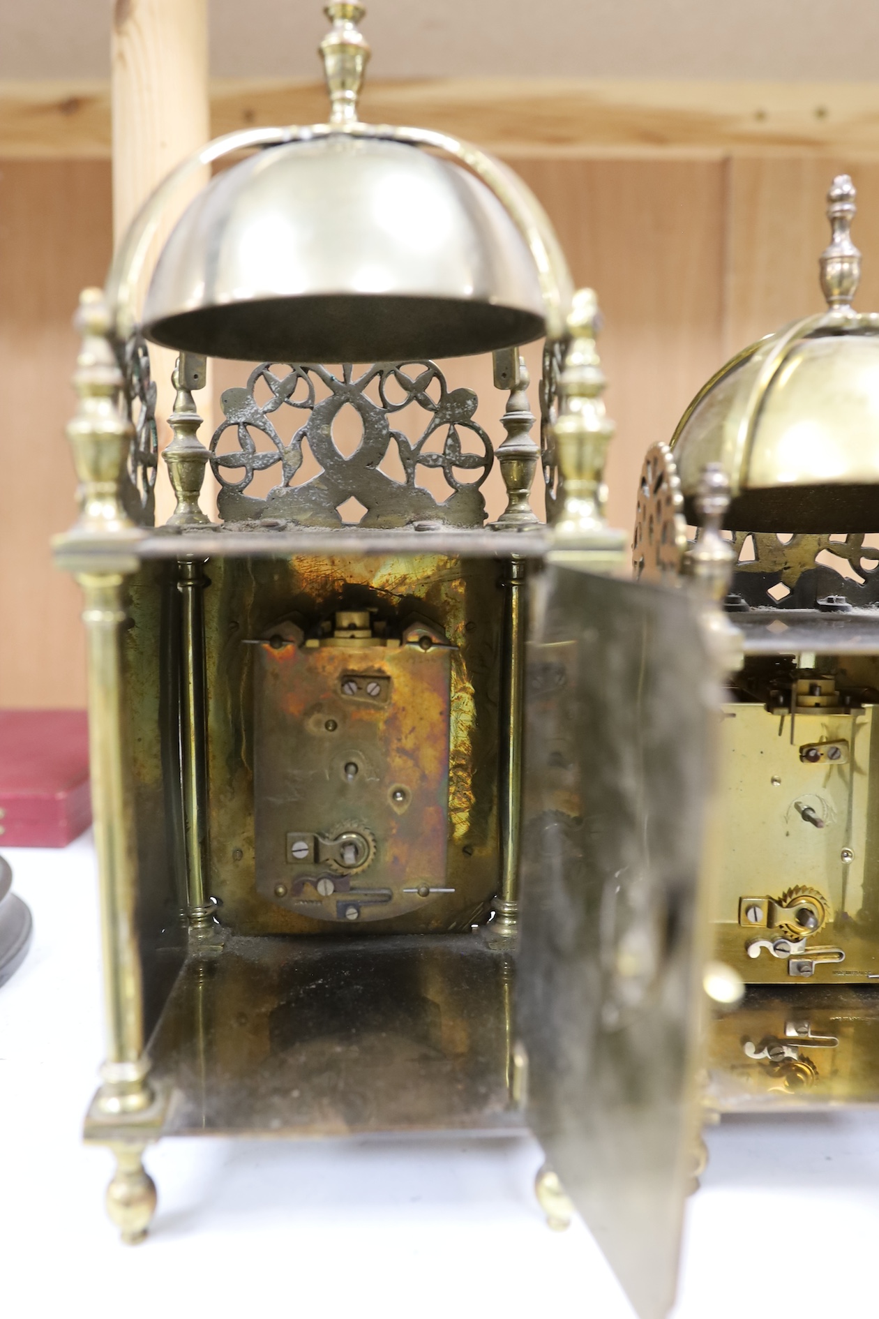 Two brass lantern clocks with 20th century escapement units, tallest 30cm high. Condition - fair